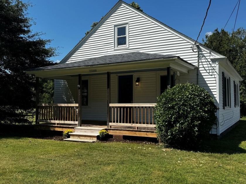 Come home to this charming and affordable country home featuring - Beach Home for sale in Bloxom, Virginia on Beachhouse.com