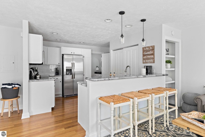 Overlooking a park in downtown Traverse City, this condo offers - Beach Condo for sale in Traverse City, Michigan on Beachhouse.com