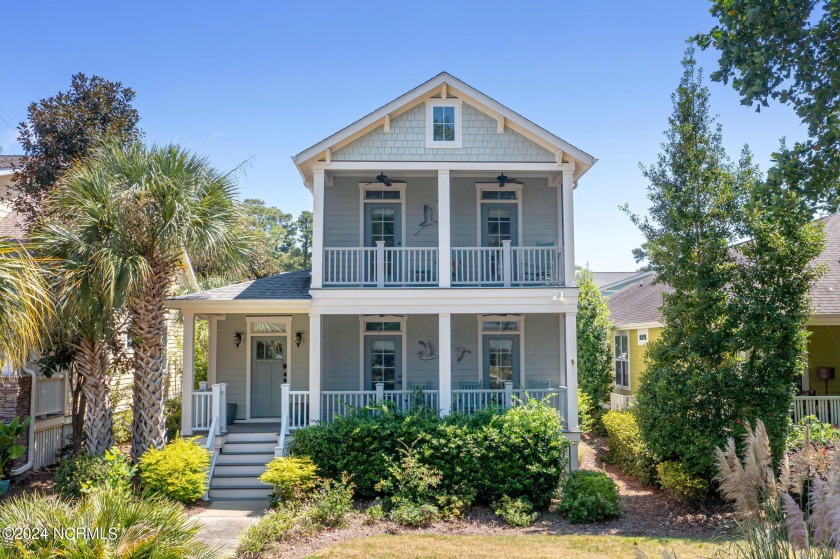 Discover this charming Charleston-style cottage, offering - Beach Home for sale in Ocean Isle Beach, North Carolina on Beachhouse.com