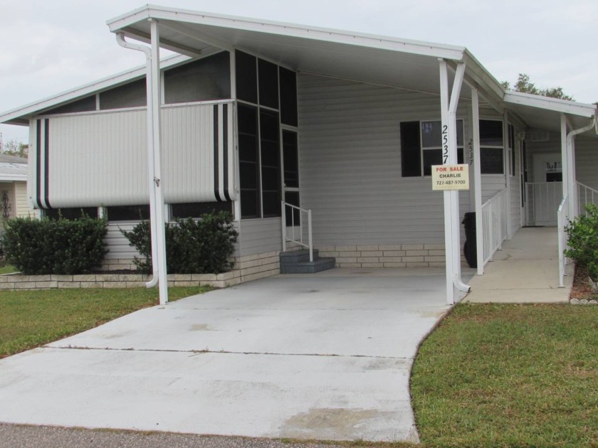 FURNISHED 2 BED 2 BATH JACOBSEN   Open kitchen with center two - Beach Home for sale in Trinity, Florida on Beachhouse.com