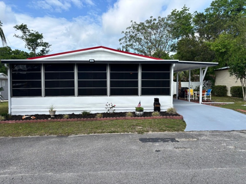 This charming two-bedroom, two-bath Palm Harbor home is nestled - Beach Home for sale in St Augustine, Florida on Beachhouse.com