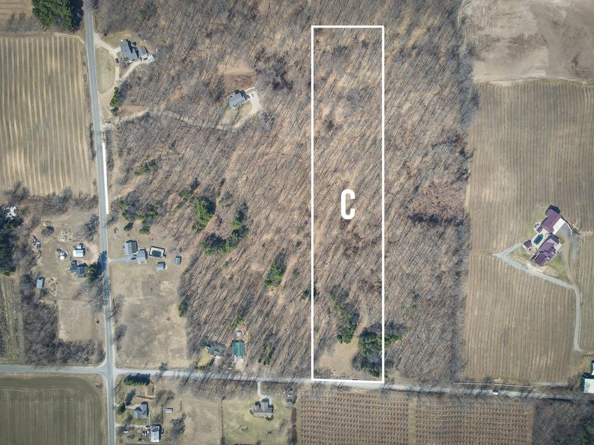 Tucked away on nearly 10 wooded acres in Oceana County, this 9 - Beach Acreage for sale in New Era, Michigan on Beachhouse.com