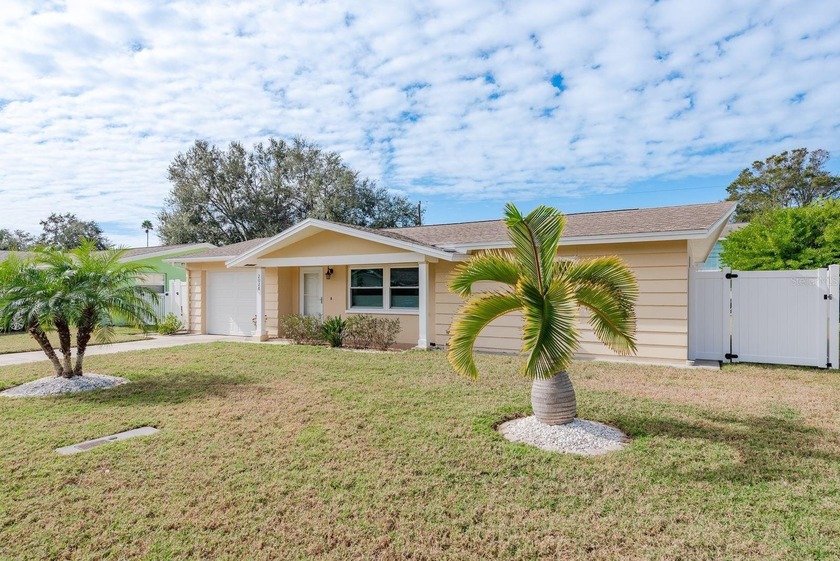 This move-in ready home is perfectly situated between vibrant - Beach Home for sale in Dunedin, Florida on Beachhouse.com