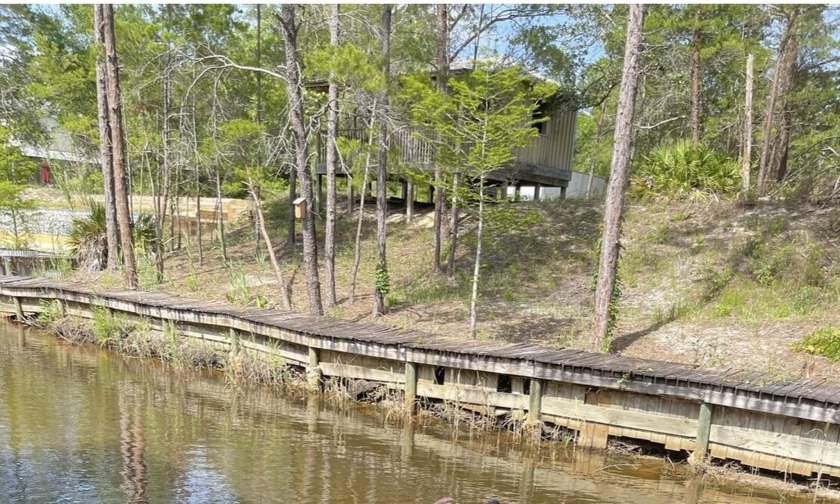 Build your dream home on this canal front lot with bay access - Beach Lot for sale in Santa Rosa Beach, Florida on Beachhouse.com