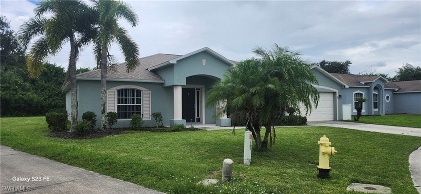 BEAUTIFUL 4 BEDROOM 2 BATH RANCH HOME WITH LARGE OUTDOOR LIVING - Beach Home for sale in Fort Myers, Florida on Beachhouse.com