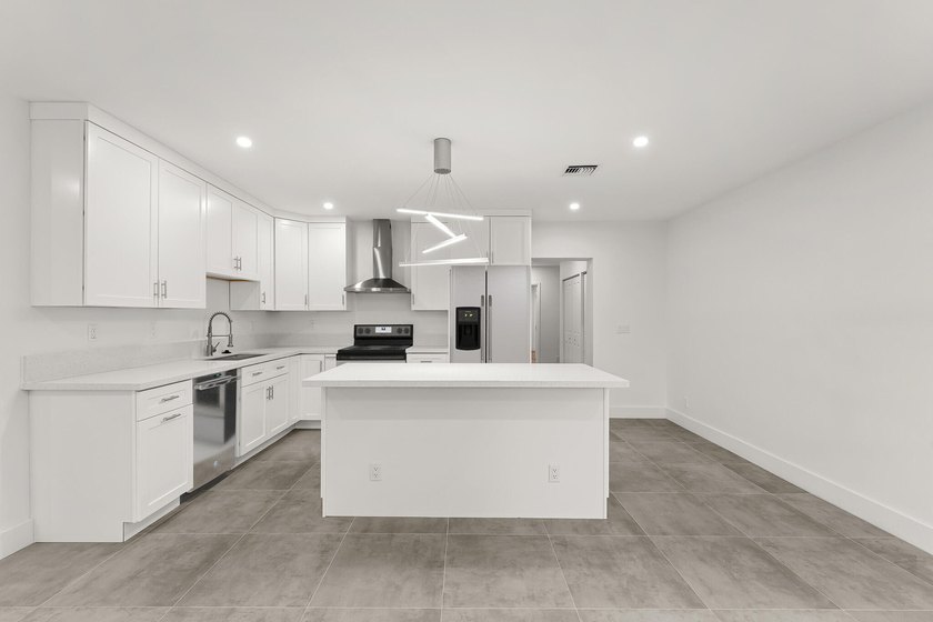 Completely renovated 3 bedroom, 2 bathroom home that lives like - Beach Home for sale in Riviera Beach, Florida on Beachhouse.com