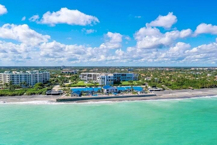 In the Heart of Jupiter Beach with exceptional privacy, this - Beach Condo for sale in Jupiter, Florida on Beachhouse.com