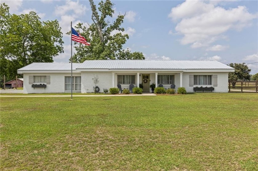 Tucked away on 9.2 scenic acres, this beautiful property offers - Beach Home for sale in Grand Bay, Alabama on Beachhouse.com