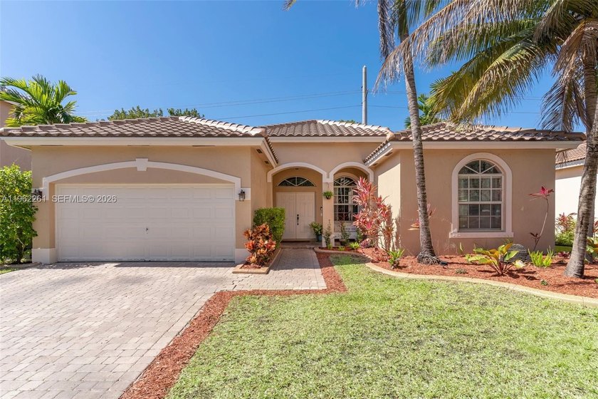 Enjoy peaceful waterside living and beautiful sunset skies from - Beach Home for sale in Homestead, Florida on Beachhouse.com