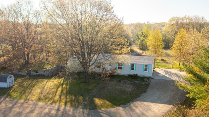 Nestled on 6.5 acres in Hamlin township, this home has so much - Beach Home for sale in Ludington, Michigan on Beachhouse.com
