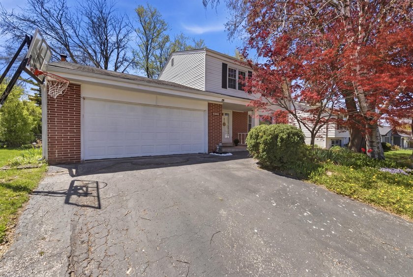 Welcome home to this inviting 4-bedroom home in Grafton - Beach Home for sale in Grafton, Wisconsin on Beachhouse.com