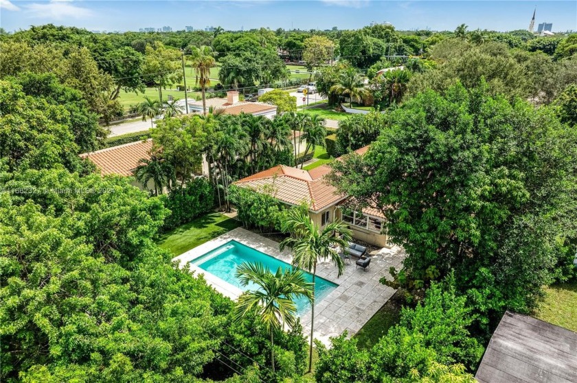 If you're seeking charm, a spacious backyard, and a prime - Beach Home for sale in Miami Shores, Florida on Beachhouse.com