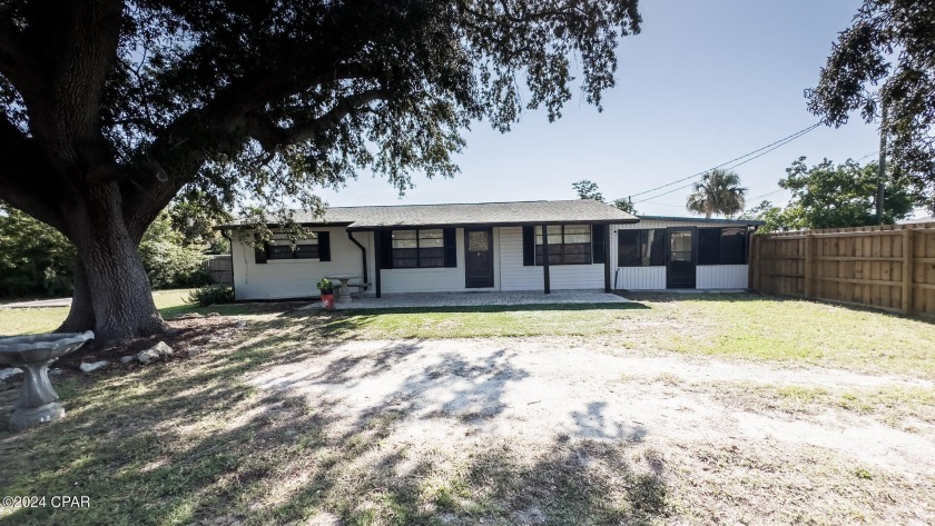 This charming 3-bedroom, 1-bath home is move-in ready with - Beach Home for sale in Panama City, Florida on Beachhouse.com