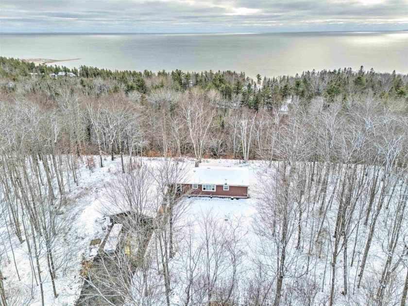 Step inside this 3-bedroom, 1.5 bath ranch-style home offering a - Beach Home for sale in Manistique, Michigan on Beachhouse.com