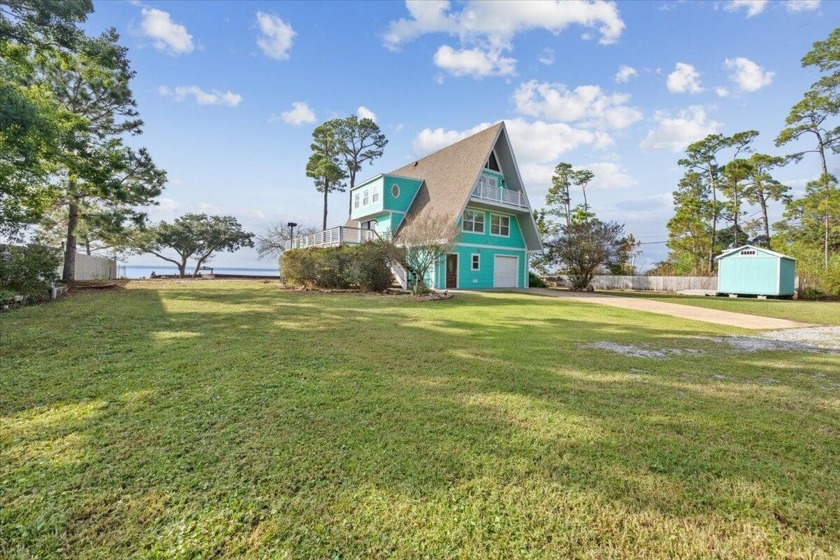 Discover this charming 4-bedroom, 3-bath home nestled along the - Beach Home for sale in Milton, Florida on Beachhouse.com