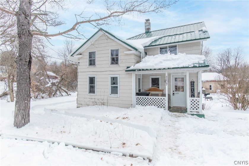 Welcome to this charming home nestled in the village of - Beach Home for sale in Chaumont, New York on Beachhouse.com