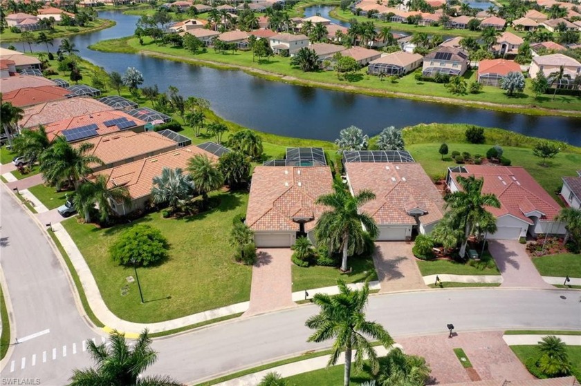 Nestled on a corner lot within the serene community of - Beach Home for sale in Naples, Florida on Beachhouse.com