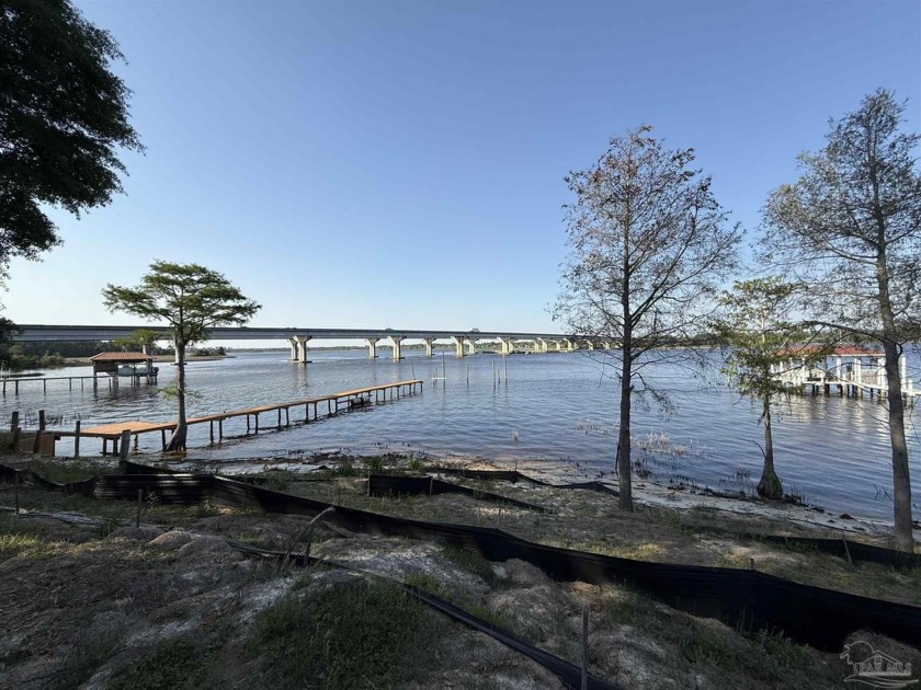 This generously sized residential, waterfront vacant land - Beach Lot for sale in Milton, Florida on Beachhouse.com