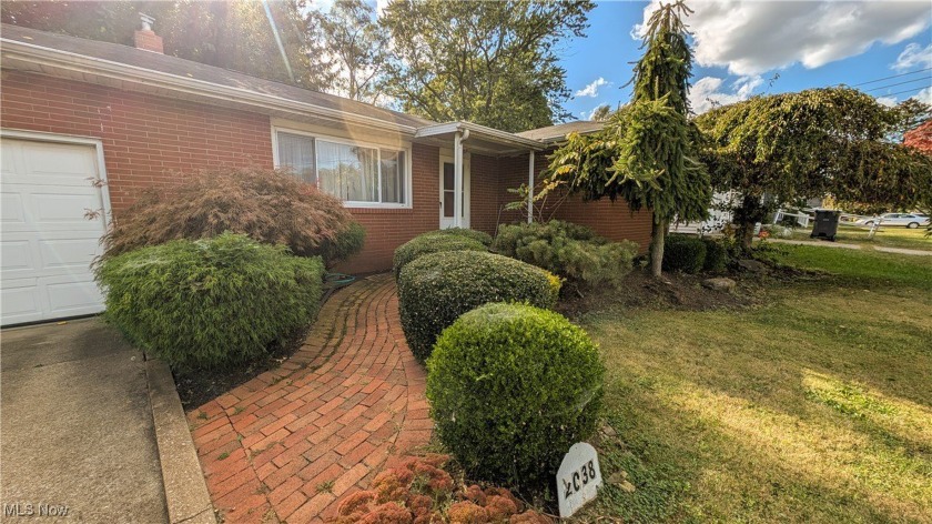 Welcome home to this charming ALL BRICK one-story filled with - Beach Home for sale in Sandusky, Ohio on Beachhouse.com