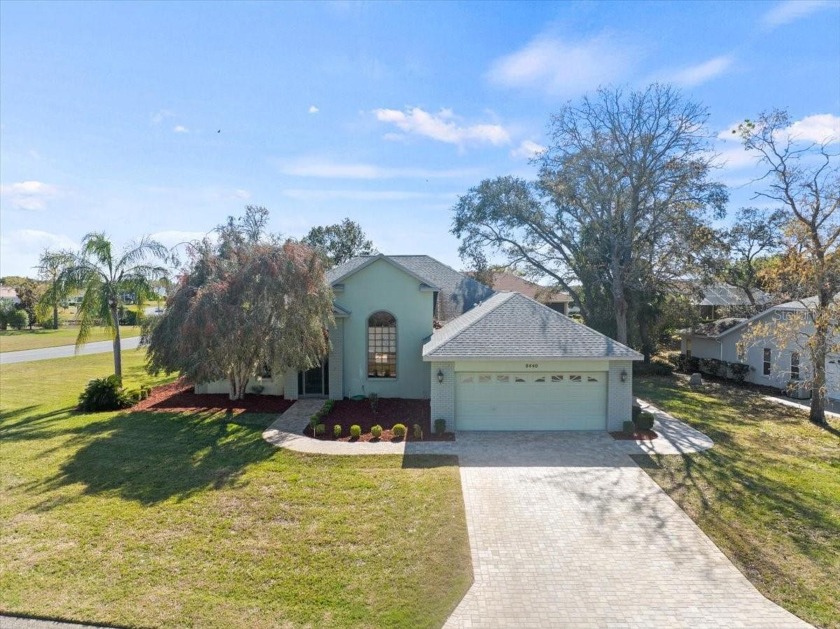 Situated on a large .34 corner lot, this beautifully landscaped - Beach Home for sale in Weeki Wachee, Florida on Beachhouse.com