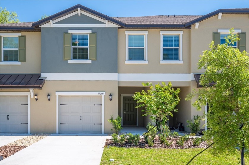 OFFERED BELOW BUILDER PRICING! Welcome to Angeline, a new 6,200+ - Beach Townhome/Townhouse for sale in Land O Lakes, Florida on Beachhouse.com
