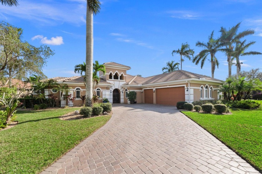 Welcome to this exquisite custom-built courtyard home, perfectly - Beach Home for sale in Palm City, Florida on Beachhouse.com