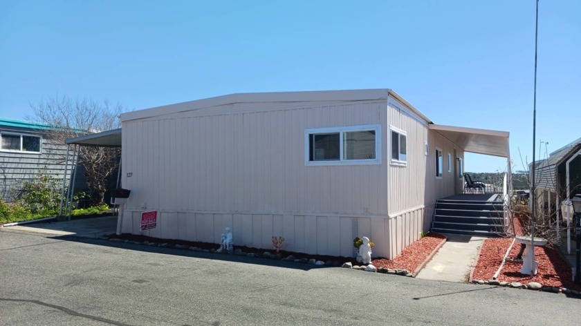 This lovely home in a beautiful, 55+, rent control, park has - Beach Home for sale in Oceanside, California on Beachhouse.com