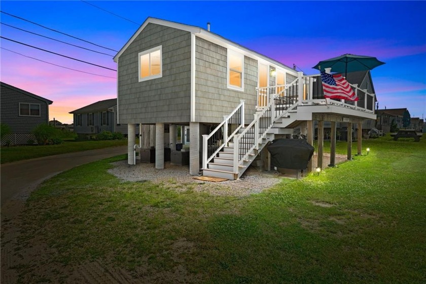 This summer cottage is beautifully appointed with a very - Beach Home for sale in South Kingston, Rhode Island on Beachhouse.com