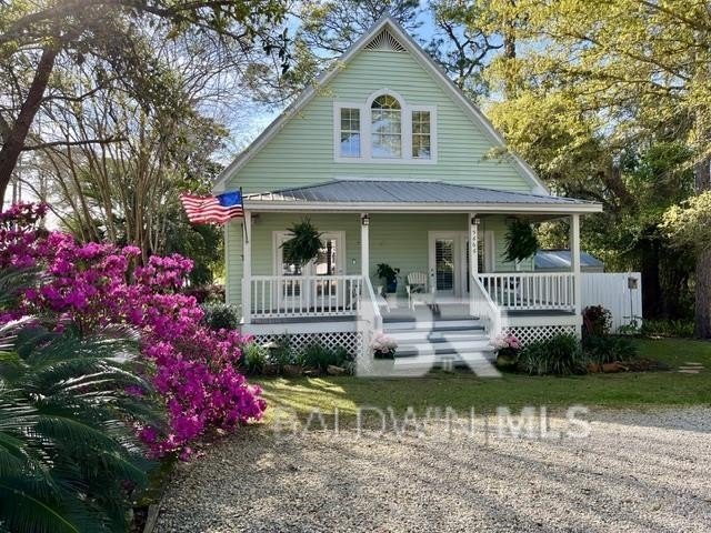 Known as one of the most charming cottages in Bear Point, this - Beach Home for sale in Orange Beach, Alabama on Beachhouse.com