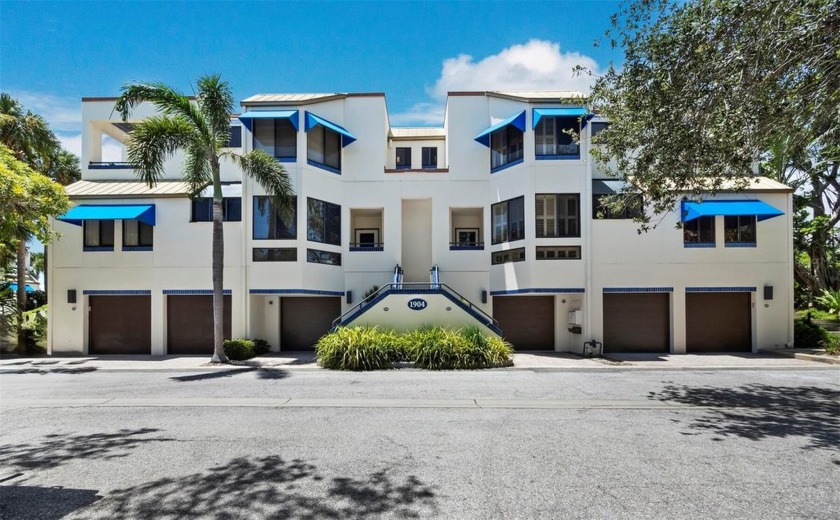 Bathed in natural light, this 2BR, 2.5BA townhome in Fairway Bay - Beach Condo for sale in Longboat Key, Florida on Beachhouse.com