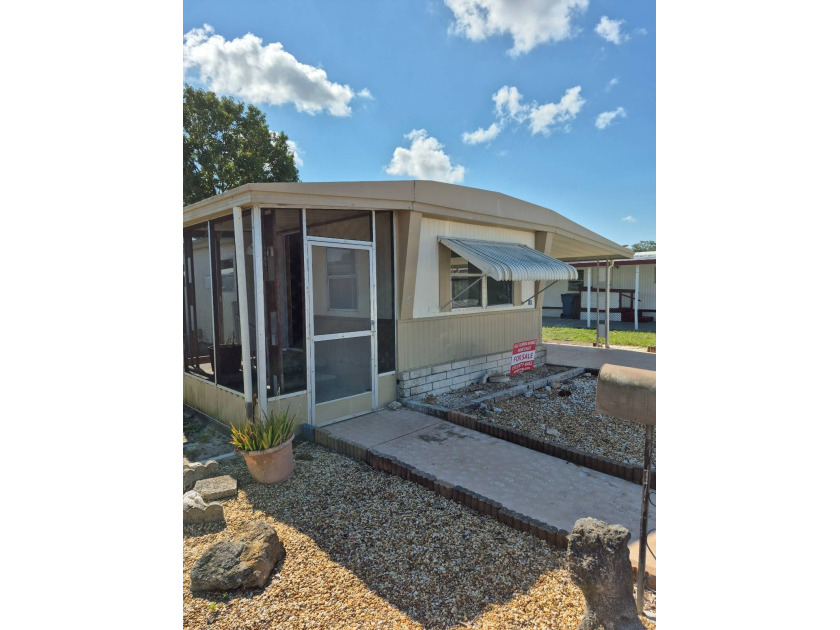 Nice updated single wide mobile home, located in Quiet Community - Beach Home for sale in New Port Richey, Florida on Beachhouse.com