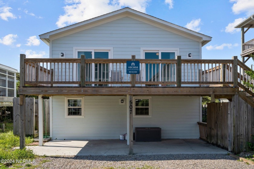 This income producing home is completely upgraded and well kept - Beach Home for sale in Surf City, North Carolina on Beachhouse.com