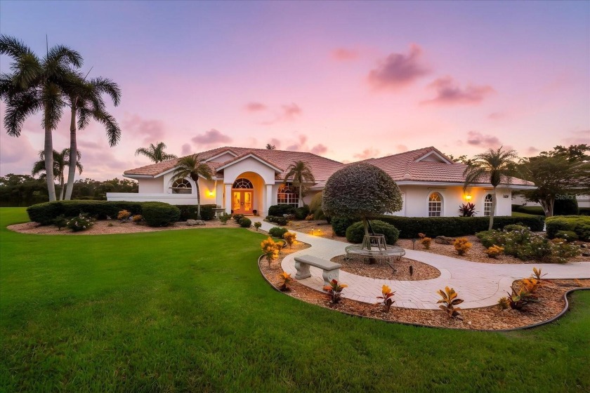 Find your sanctuary in a home where stunning lake views provide - Beach Home for sale in Sarasota, Florida on Beachhouse.com