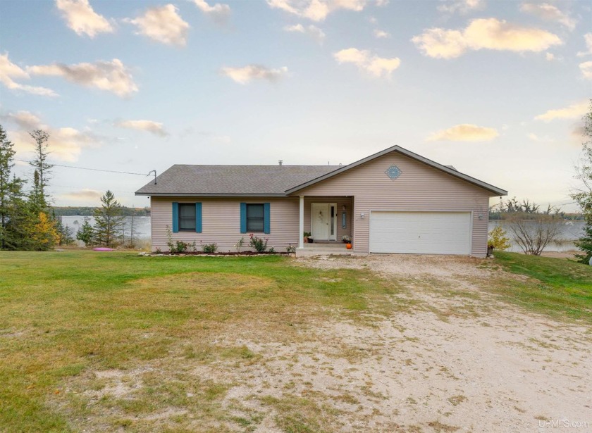 Discover the perfect waterfront retreat with this stunning - Beach Home for sale in Garden, Michigan on Beachhouse.com