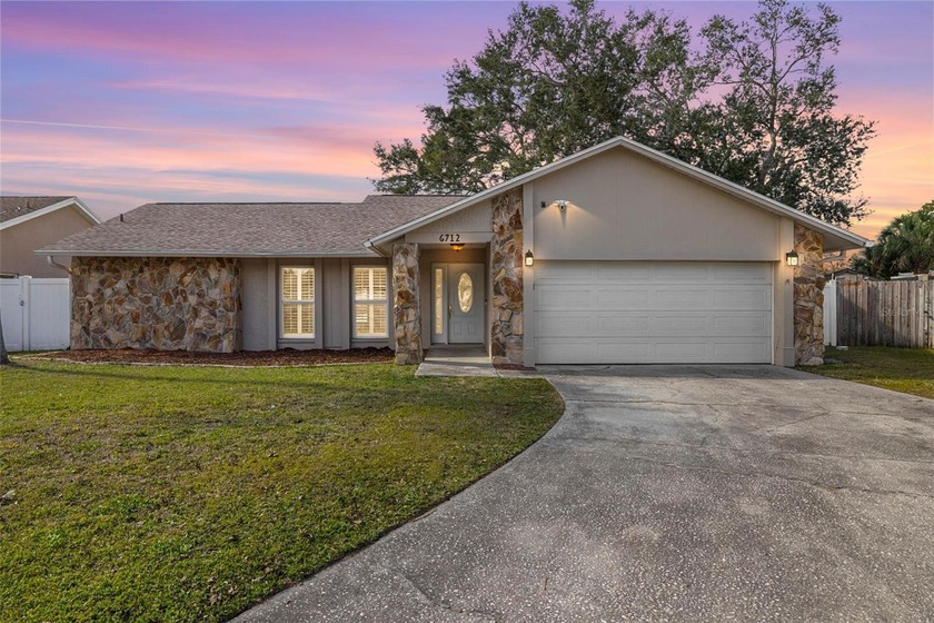 Beautifully updated and thoughtfully designed, this lakefront - Beach Home for sale in Tampa, Florida on Beachhouse.com