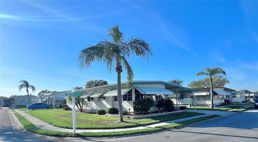 Welcome to this charming 2-bedroom, 2-bathroom home, ideally - Beach Home for sale in Largo, Florida on Beachhouse.com