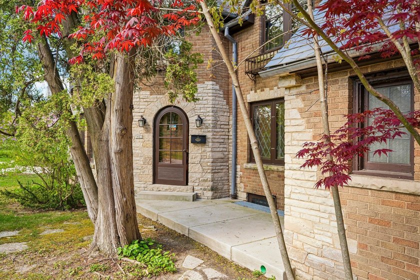 Set on a charming, tree-lined street in the heart of Fox Point - Beach Home for sale in Fox Point, Wisconsin on Beachhouse.com