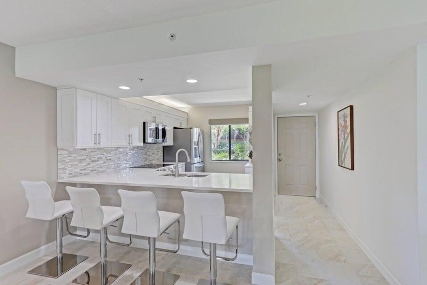 Are you looking for a ground floor condo with a water view that - Beach Condo for sale in Jupiter, Florida on Beachhouse.com