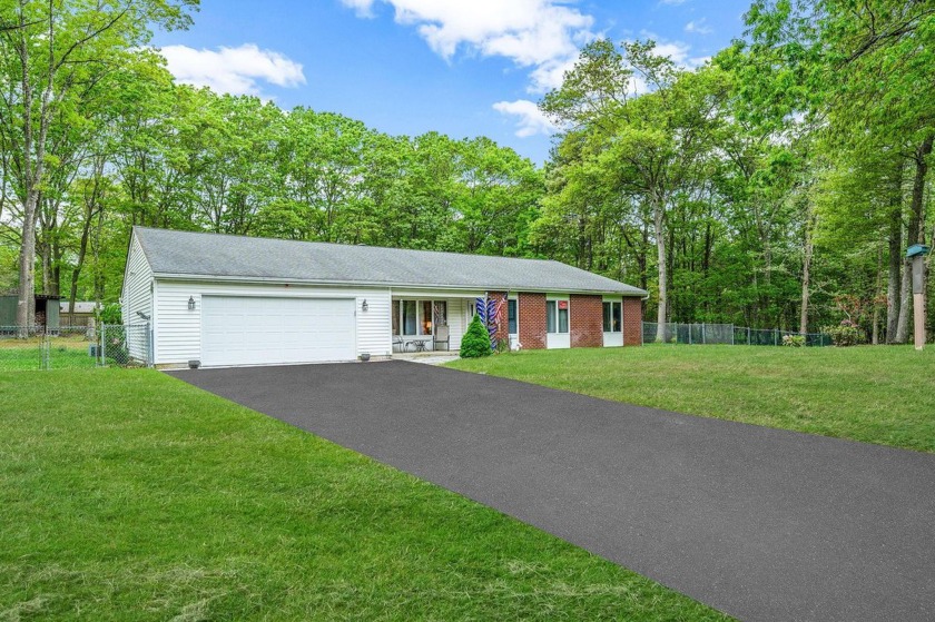 Welcome to 36 Scout Trail in Ridge--an exceptional gem tucked - Beach Home for sale in Ridge, New York on Beachhouse.com