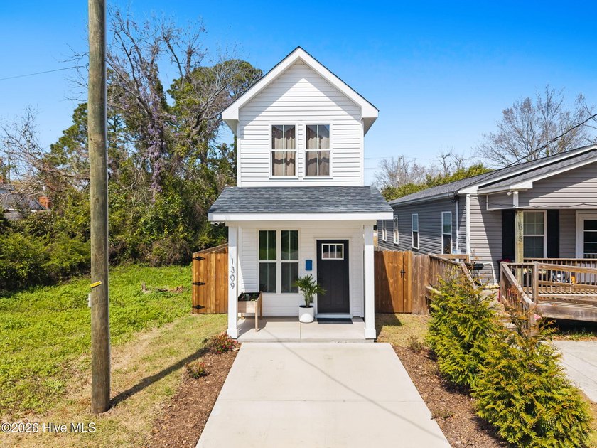 Just minutes from downtown Wilmington, this iconic coastal row - Beach Home for sale in Wilmington, North Carolina on Beachhouse.com