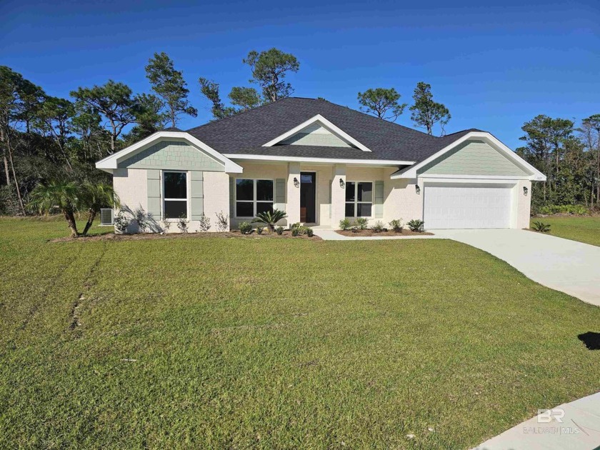 Welcome to this 4 bedroom 2 bath home.  It offers an open floor - Beach Home for sale in Gulf Shores, Alabama on Beachhouse.com