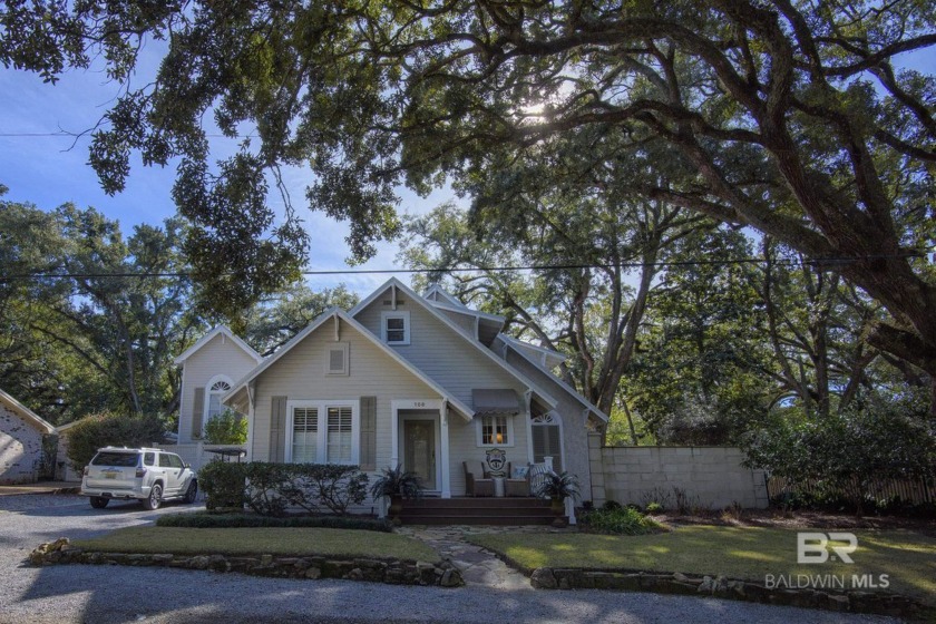 Nestled high on a bluff in downtown Fairhope, this iconic home - Beach Home for sale in Fairhope, Alabama on Beachhouse.com