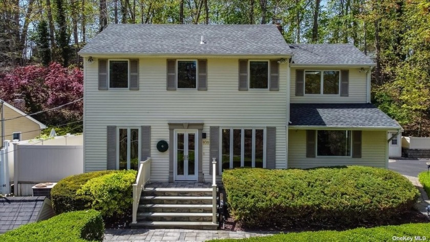 Privacy and greenery abound at this light and bright four - Beach Home for sale in Northport, New York on Beachhouse.com