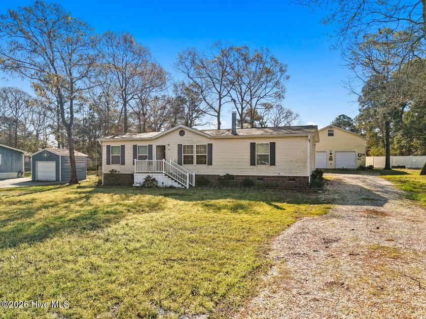 Nestled on nearly half an acre, this spacious 3-bedroom, 2-bath - Beach Home for sale in Supply, North Carolina on Beachhouse.com