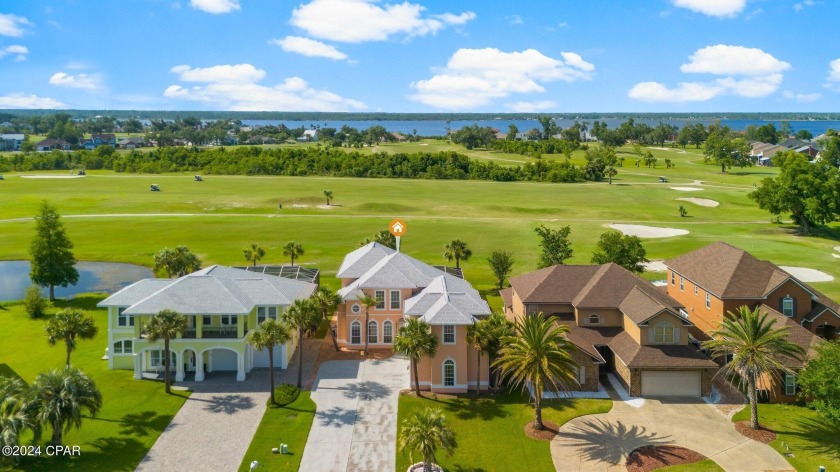 Stunning 4-Bedroom, 3-Bath Home with Pool on the Golf Course in - Beach Home for sale in Lynn Haven, Florida on Beachhouse.com