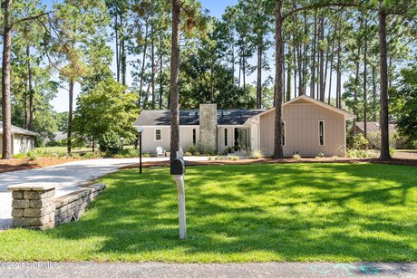 This one level, completely remodeled in 2021, home is off the - Beach Home for sale in Carolina Shores, North Carolina on Beachhouse.com