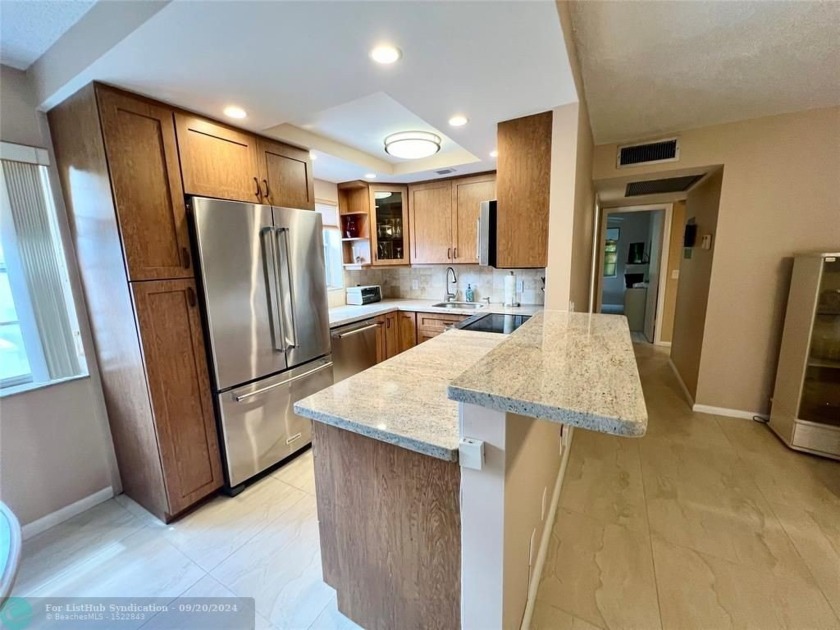 BEAUTIFULLY REMODELED CORNER CONDO WITH A EXPANSIVE WATERVIEW - Beach Condo for sale in Deerfield Beach, Florida on Beachhouse.com