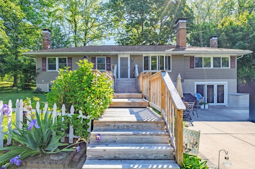 Charming 3-bedroom, 2-bath split level style home nestled on a - Beach Home for sale in Wading River, New York on Beachhouse.com