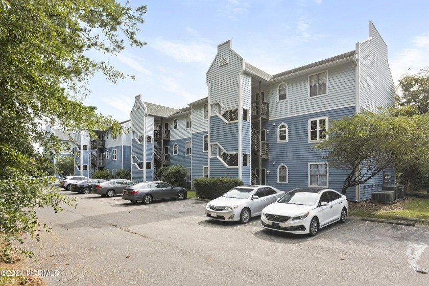 This 2 bedroom 2 bath second floor unit is move in ready!  All - Beach Condo for sale in Wilmington, North Carolina on Beachhouse.com