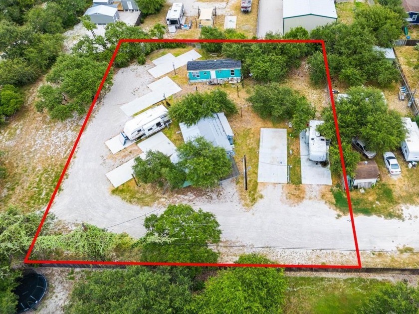 Check out this unique property on 3 wooded lots in the county - Beach Home for sale in Rockport, Texas on Beachhouse.com